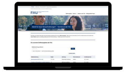 Webseitenscreenshot des Jobportals der Friedrich-Alexander-Universität Erlangen-Nürnberg angezeigt auf Laptop. Arbeiten Sie an der FAU! Es gibt freie Stellen. Starten Sie Ihre Karriere an unserer Uni!